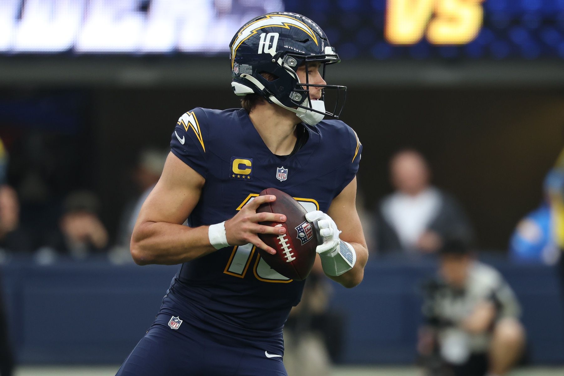 Los Angeles Chargers quarterback Justin Herbert (10) drops back to pass against the Las Vegas Raiders during the second half at SoFi Stadium.