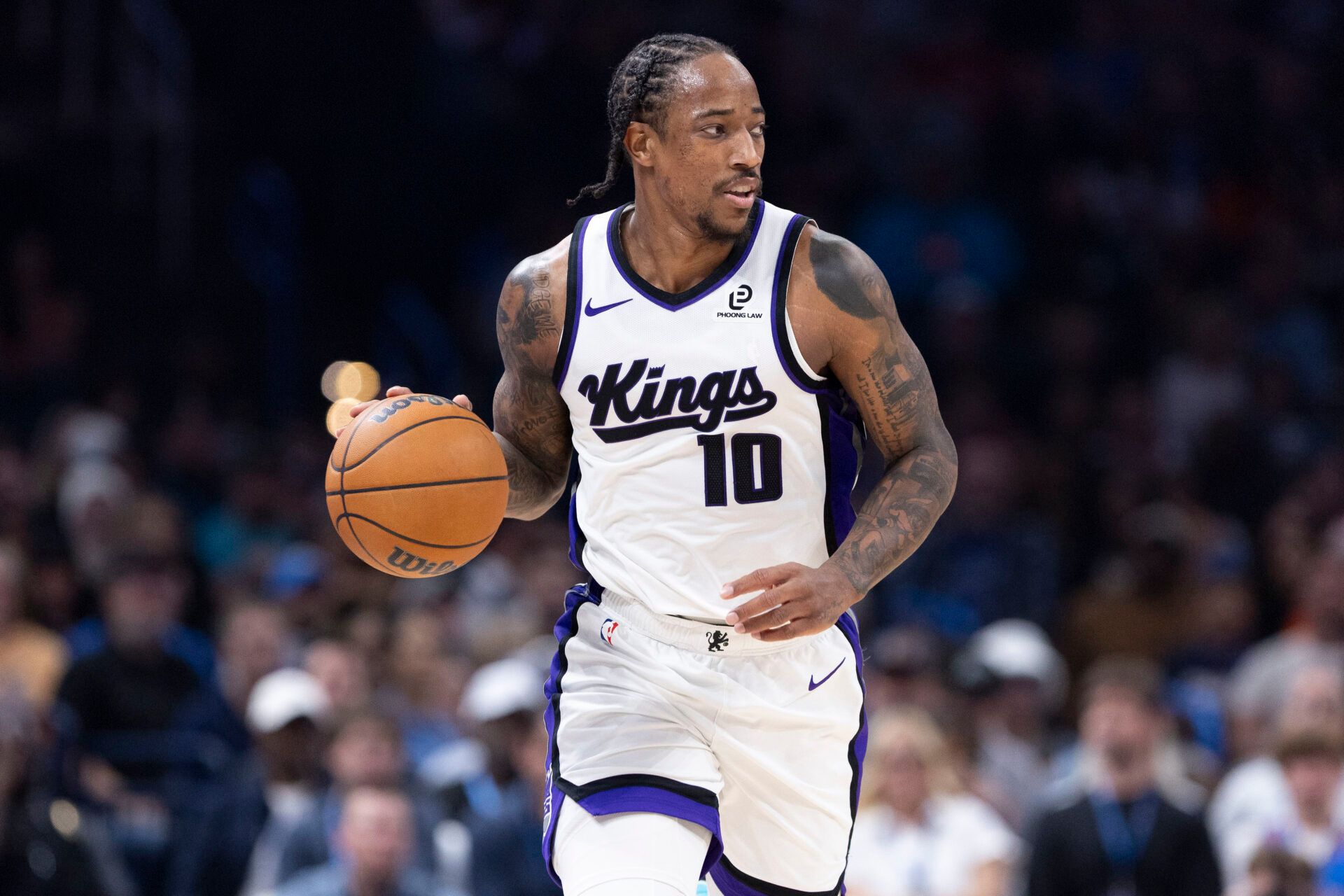 Sacramento Kings guard DeMar DeRozan (10) dribbles down the court against the Oklahoma City Thunder during the second quarter at Paycom Center.