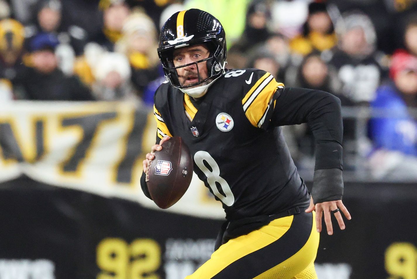 Pittsburgh Steelers quarterback Aaron Rodgers (8) looks to pass during the second quarter against the Buffalo Bills at Acrisure Stadium.