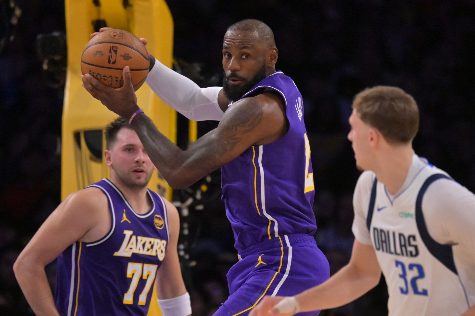 Los Angeles Lakers forward LeBron James (23) rebounds in the first half against the Dallas Mavericks at Crypto.com Arena.