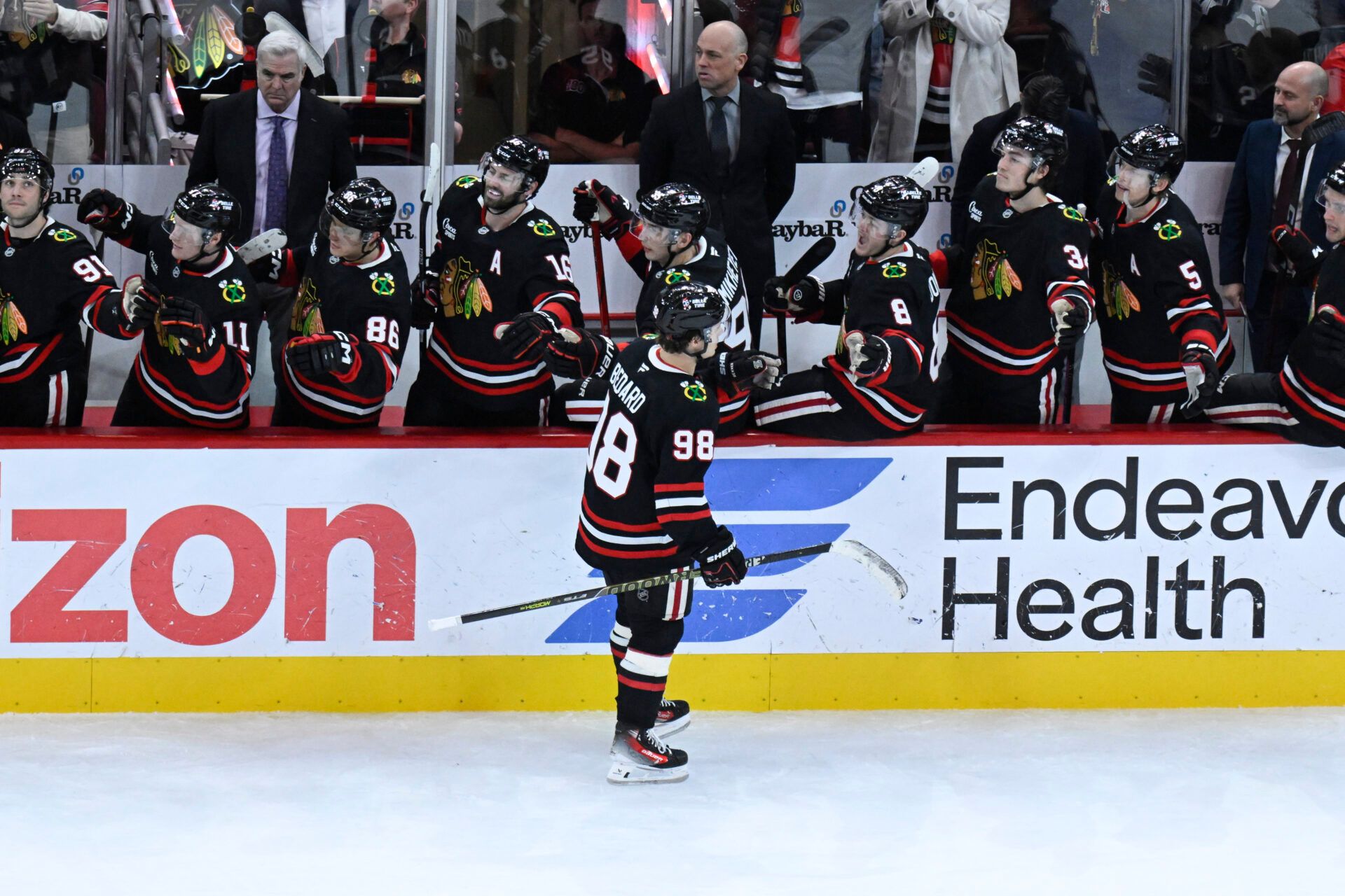 Chicago Blackhawks center Connor Bedard (98) celebrates with  teammates   after he scores a goal against the Anaheim Ducks during the third period at United Center.