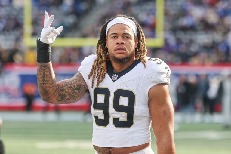 New Orleans Saints defensive end Chase Young (99) looks up at fans before the game against the New York Giants at MetLife Stadium.