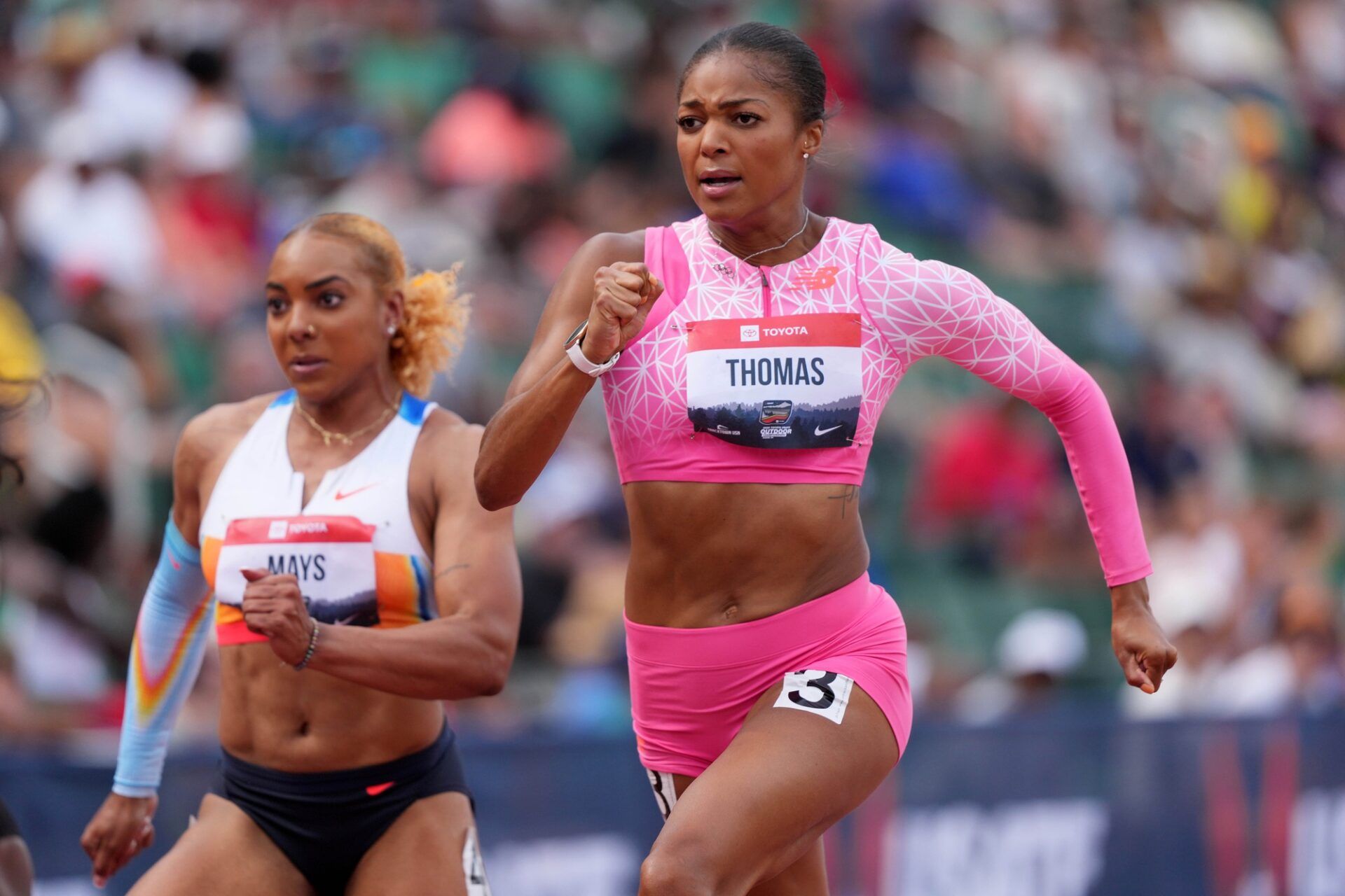 Gabby Thomas aka  Gabrielle Thomas and Jadyn Mays run in a women's 100m heat during the USATF Championships at Hayward Field.
