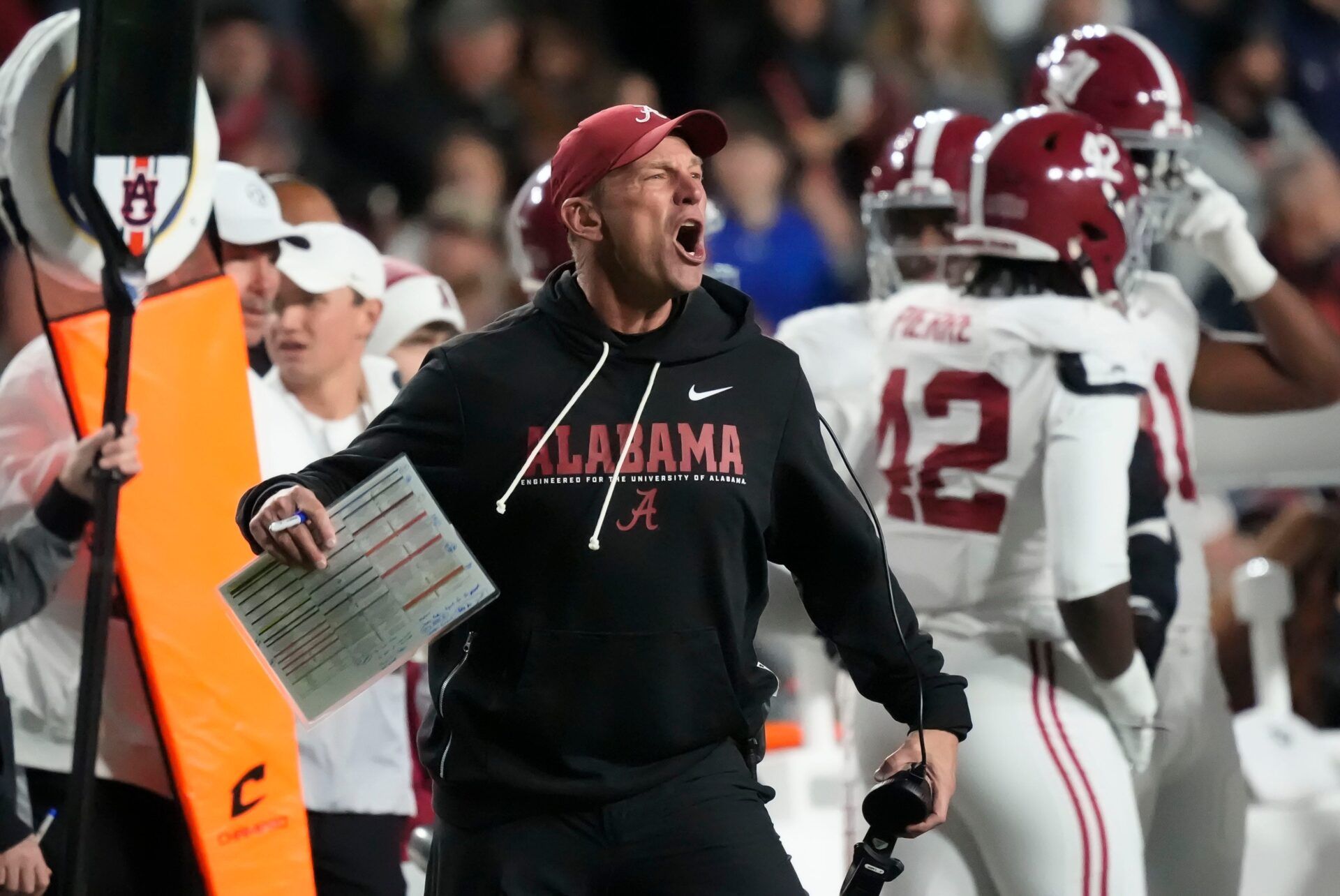 Alabama head coach Kalen DeBoer protests a personal foul call against the Crimson Tide during the game with Auburn at Jordan-Hare Stadium.