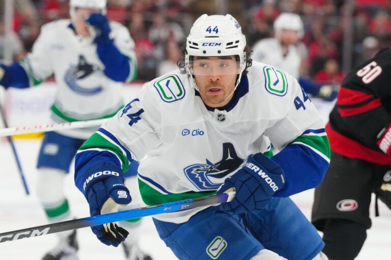 Vancouver Canucks left wing Kiefer Sherwood (44) skates against the Carolina Hurricanes during the second period at Lenovo Center.
