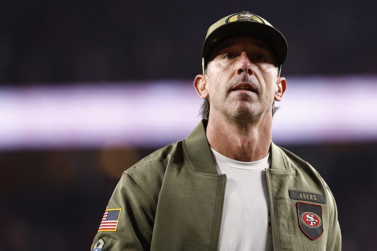 San Francisco 49ers head coach Kyle Shanahan walk off the field after defeating the Carolina Panthers at Levi's Stadium.