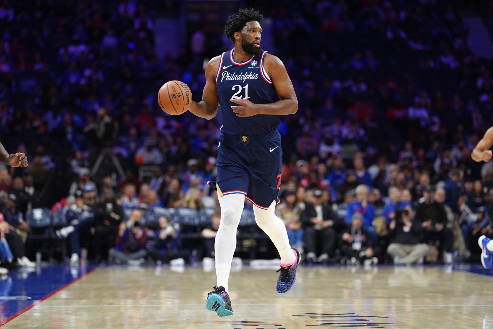 Philadelphia 76ers center Joel Embiid (21) controls the ball against the Atlanta Hawks in the third quarter at Xfinity Mobile Arena.