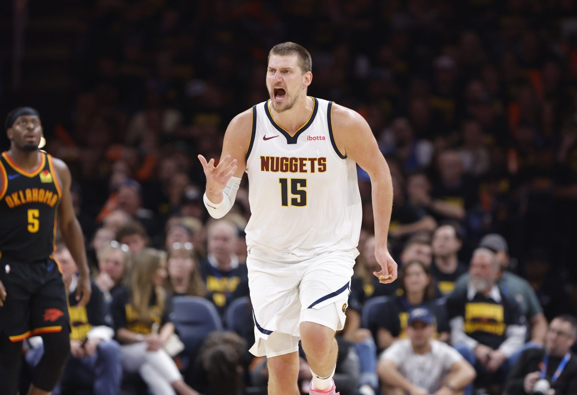 Denver Nuggets center Nikola Jokic (15) reacts after a play against the Oklahoma City Thunder in the second half during game two of the second round for the 2025 NBA Playoffs at Paycom Center.