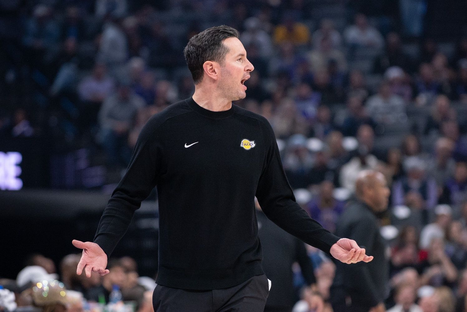 Los Angeles Lakers head coach JJ Reddick argues a call during the second quarter of the game against the Sacramento Kings at Golden 1 Center.