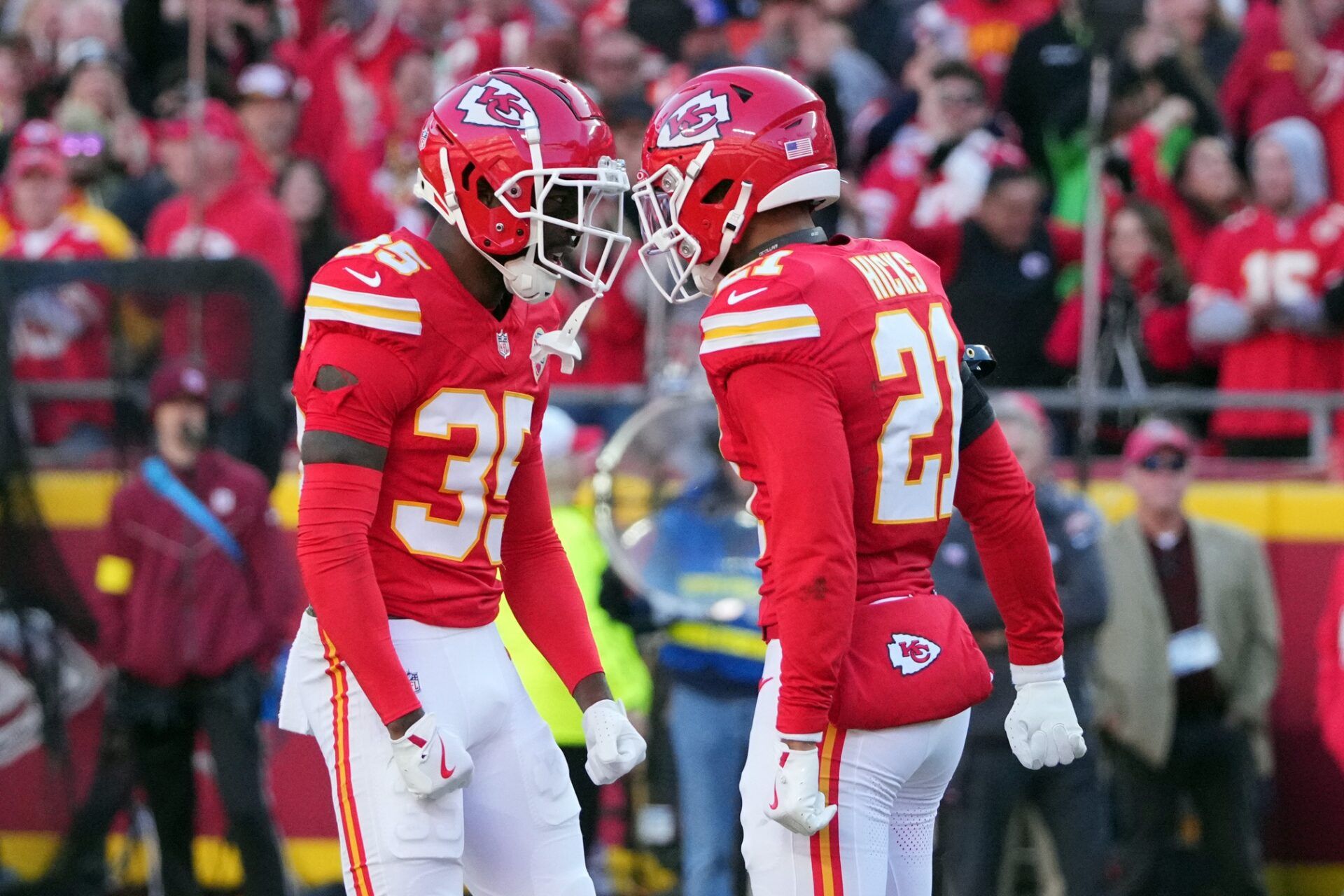 Kansas City Chiefs cornerback Jaylen Watson (35) celebrates with safety Jaden Hicks (21) after a play against the Indianapolis Colts in the second half at GEHA Field at Arrowhead Stadium.