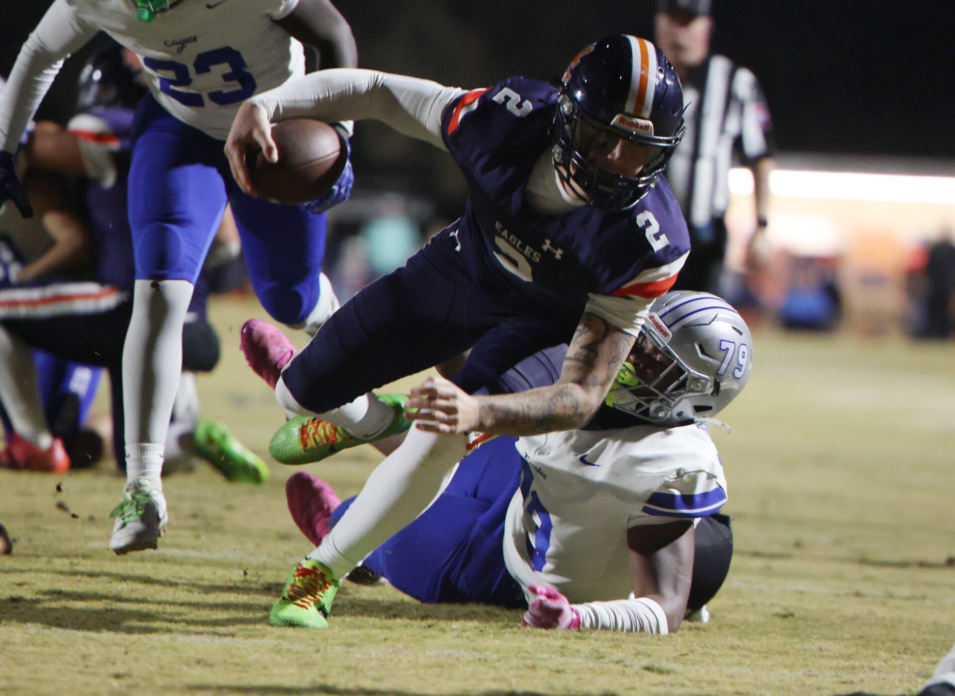 Nashville Christian's Jared Curtis (2) runs the ball past Jackson Christian's Jeremiah Jenkins (79) during their game at Nashville Christian School Friday, Nov. 14, 2021.