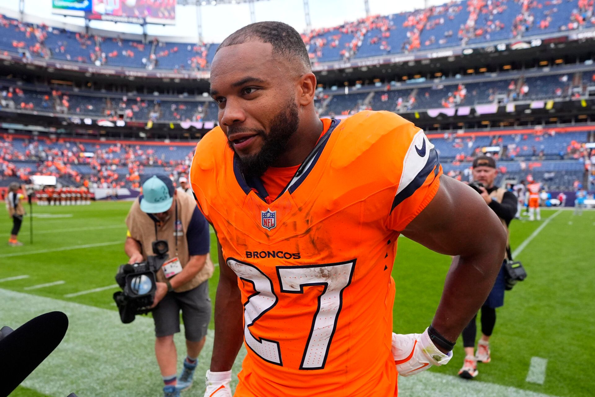 Denver Broncos running back J.K. Dobbins (27) after the game at Empower Field at Mile High.