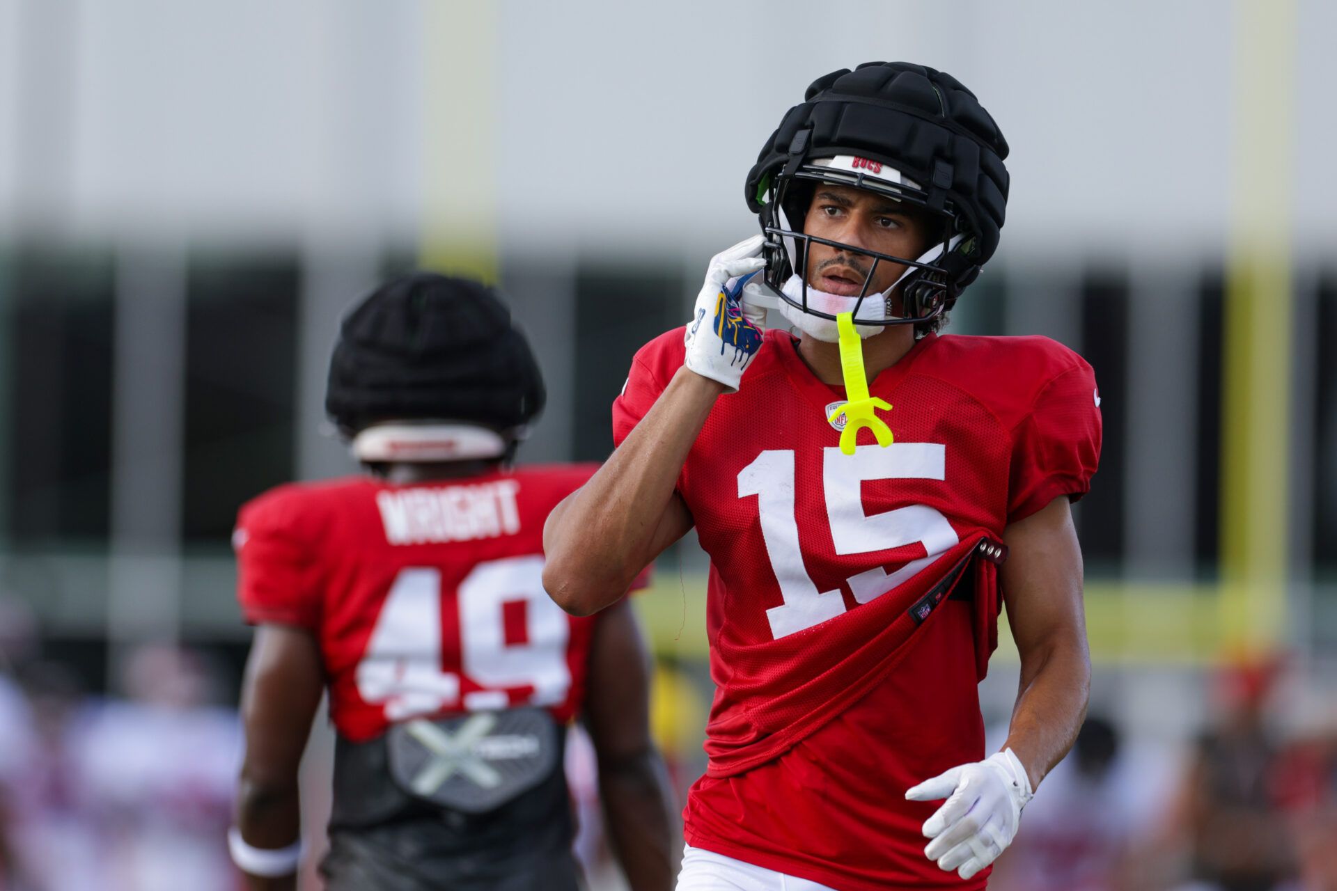 Tampa Bay Buccaneers wide receiver Jalen McMillan (15) participates in training camp at AdventHealth Training Center.