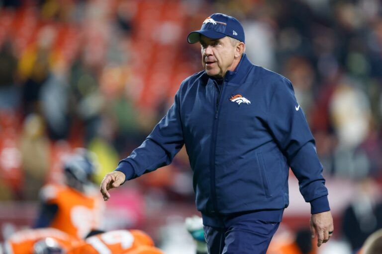 Denver Broncos head coach Sean Payton looks on during warmups prior to the game against the Washington Commanders at Northwest Stadium.