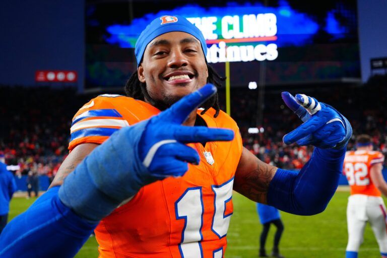 Denver Broncos linebacker Nik Bonitto (15) following the win against the Kansas City Chiefs at Empower Field at Mile High.