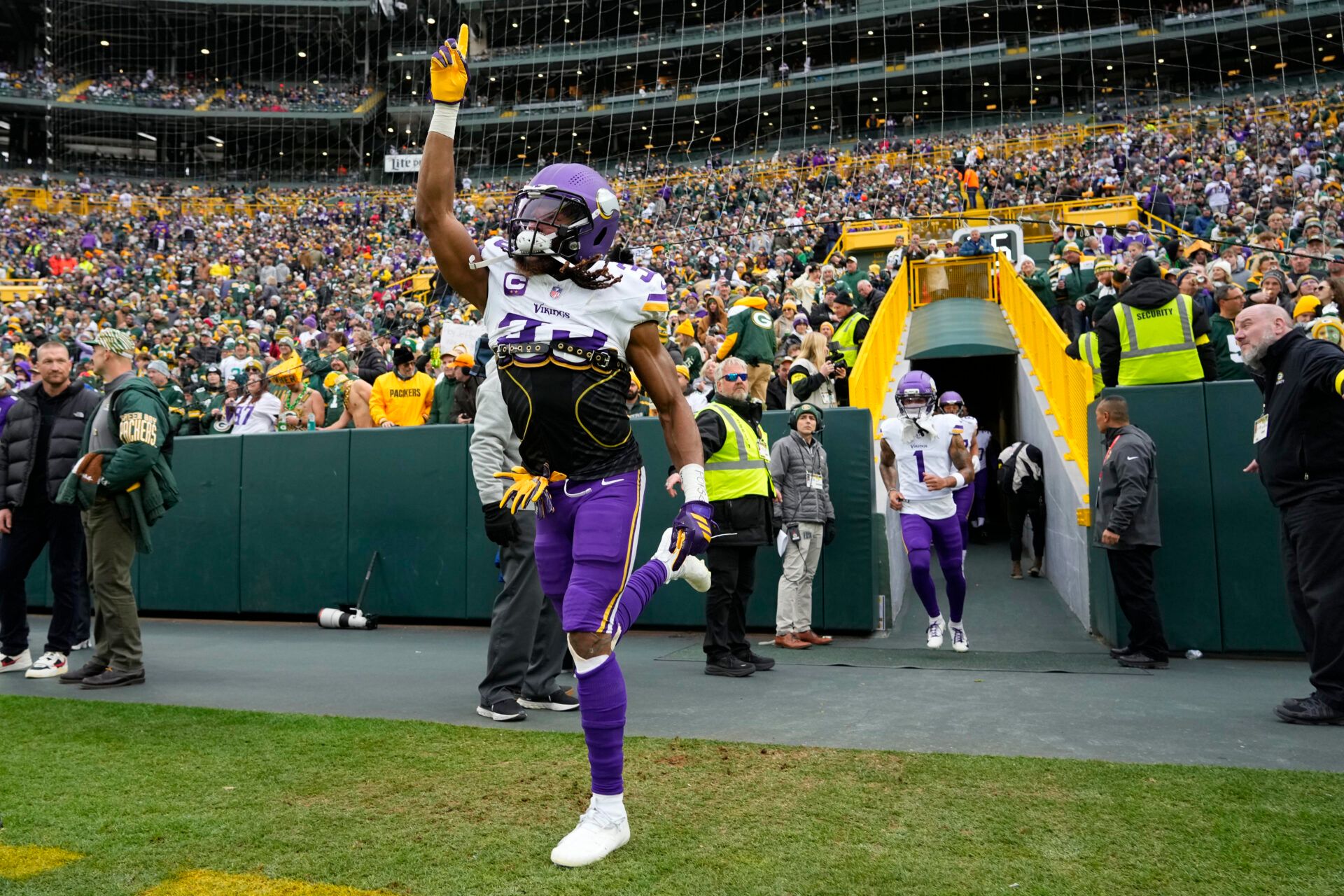 Minnesota Vikings running back Aaron Jones Sr. (33) takes the field prior to a game against the Green Bay Packers at Lambeau Field.