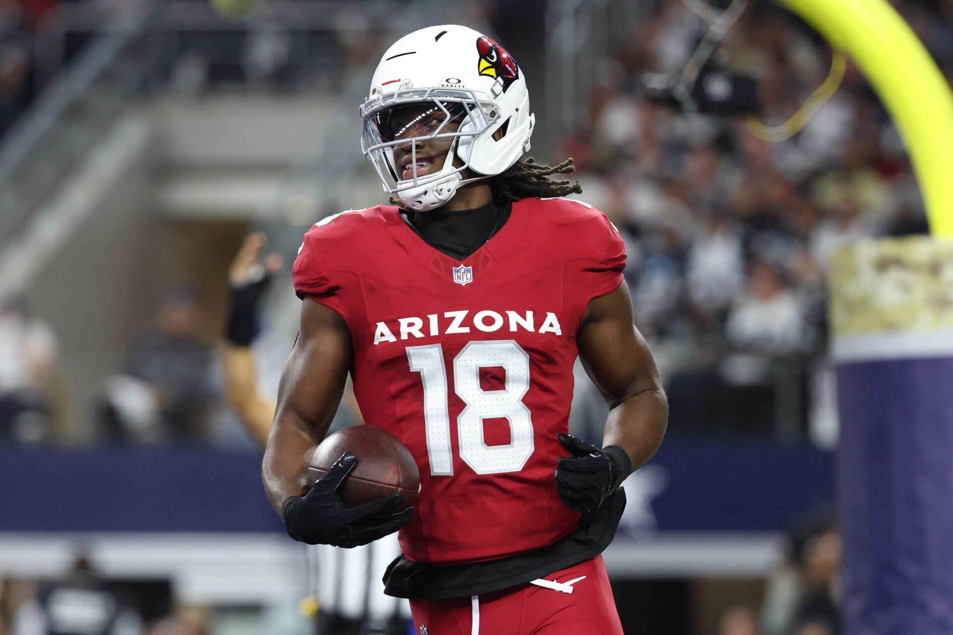 Arizona Cardinals wide receiver Marvin Harrison Jr. (18) scores a touchdown against the Dallas Cowboys in the first half at AT&T Stadium.