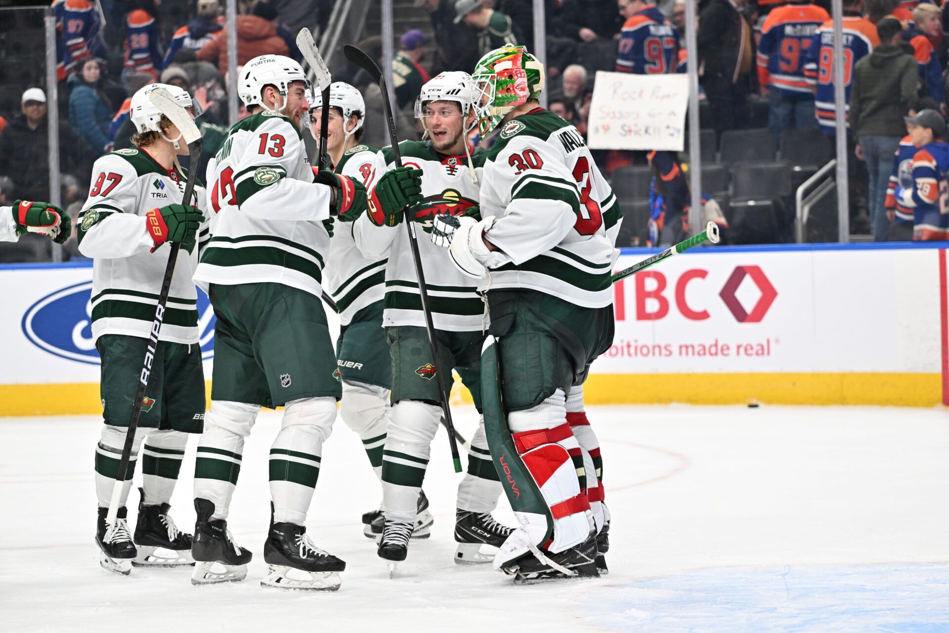 Minnesota Wild celebrate their win over the Edmonton Oilers  during the third period at Rogers Place.