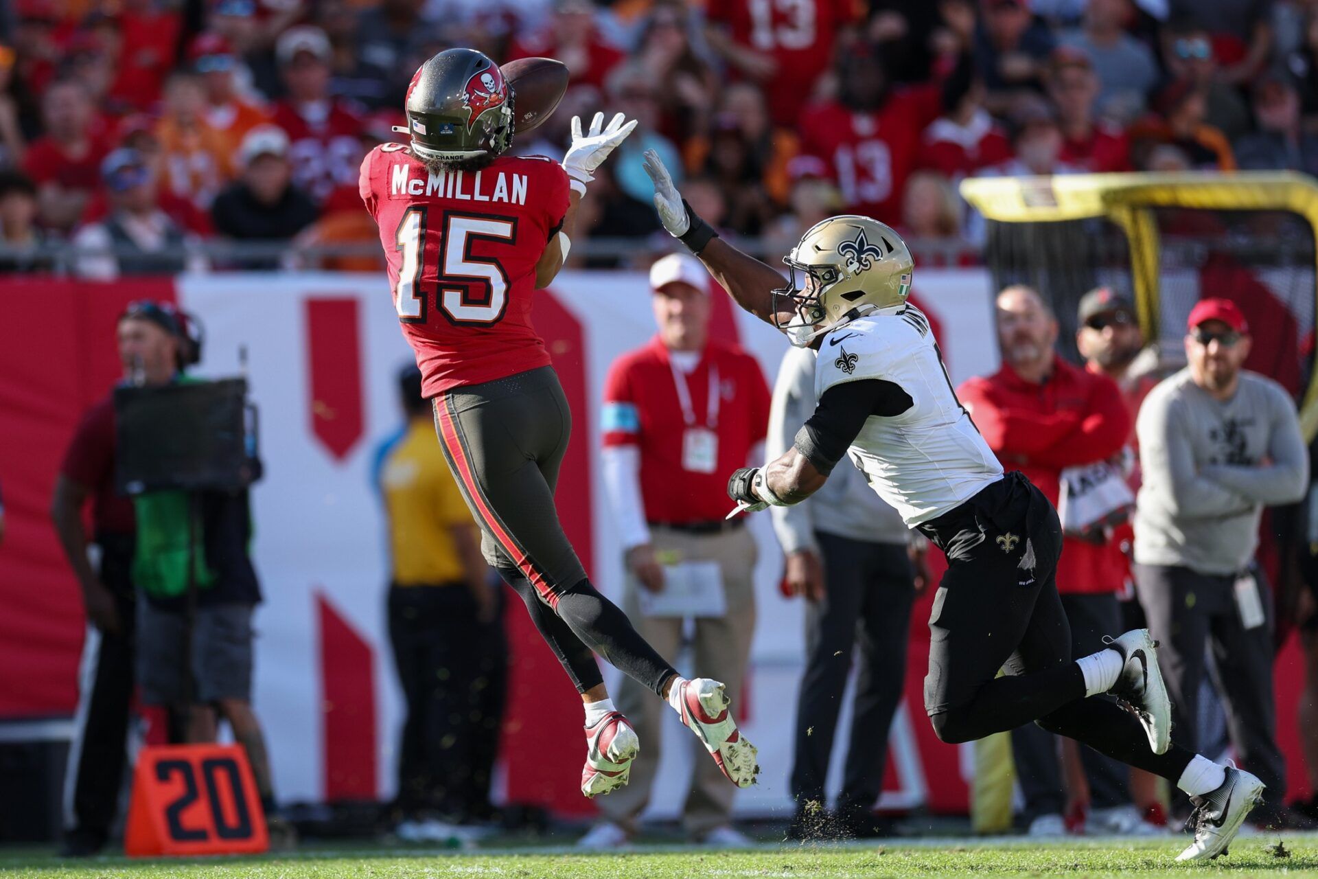 Tampa Bay Buccaneers wide receiver Jalen McMillan (15) catches a pass against the New Orleans Saints in the fourth quarter at Raymond James Stadium.