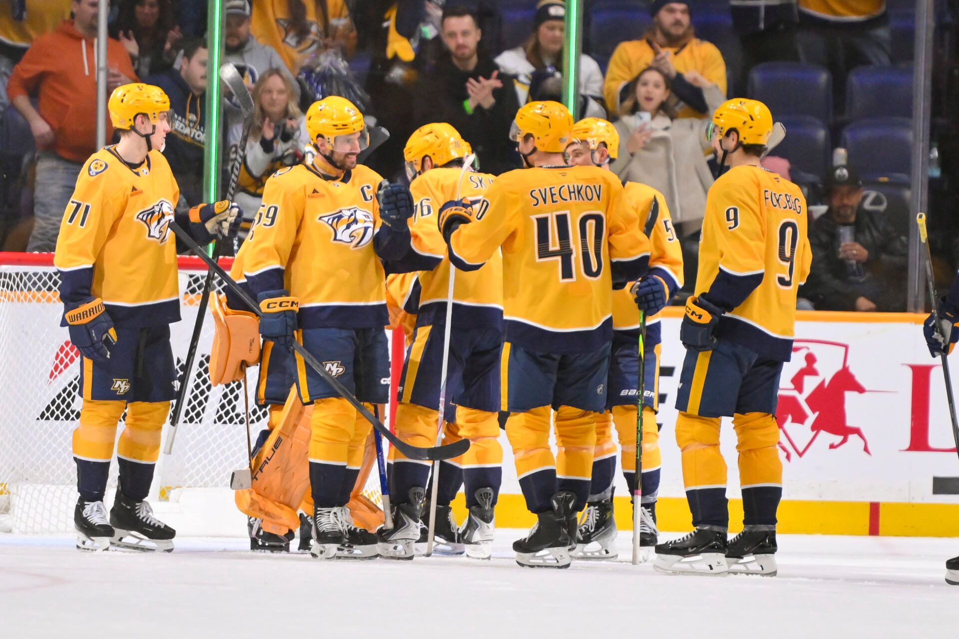 Nashville Predators celebrates the win against the Calgary Flames during the third period at Bridgestone Arena.