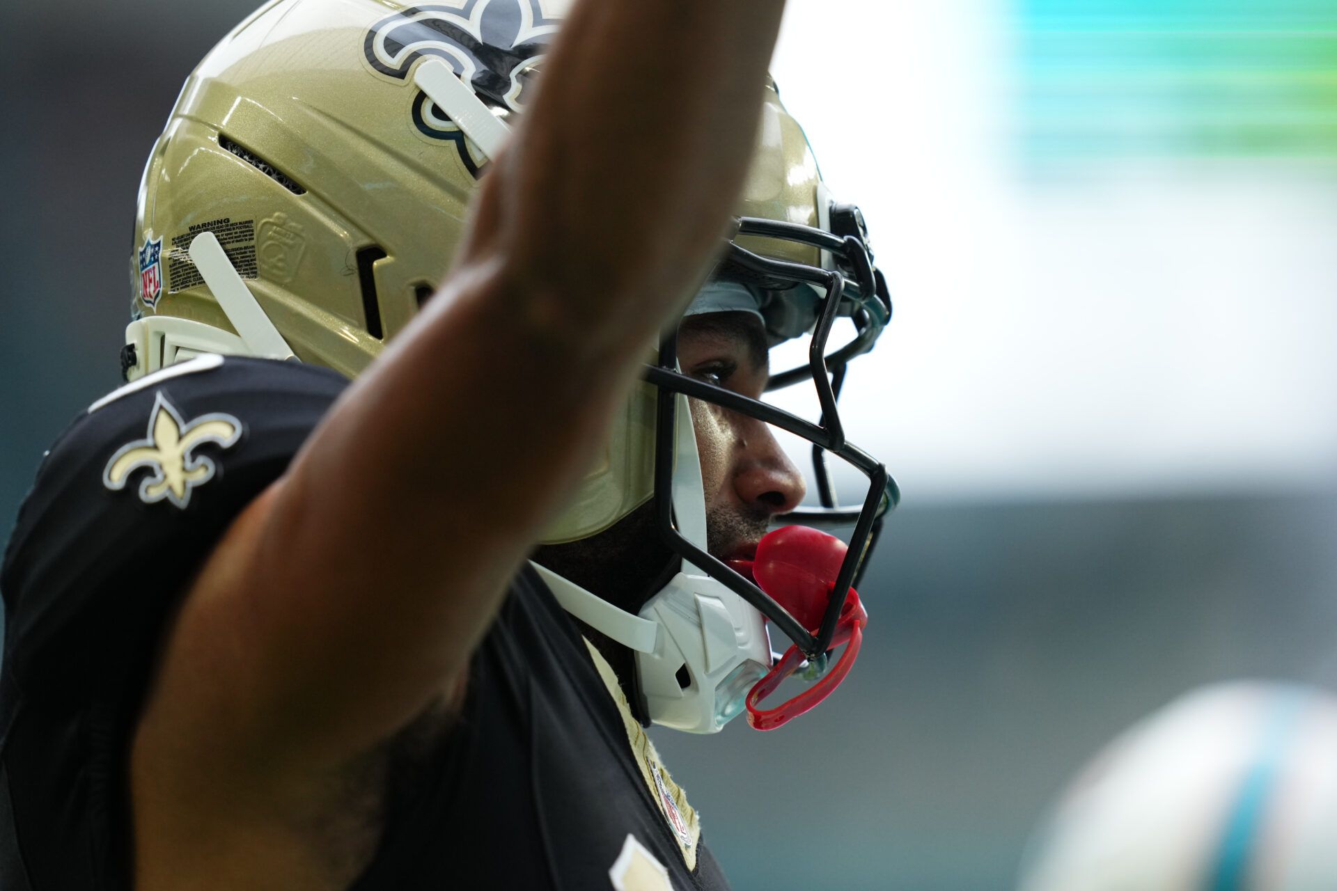 New Orleans Saints wide receiver Chris Olave (12) celebrates scoring touchdown against the Miami Dolphins during the second half at Hard Rock Stadium.