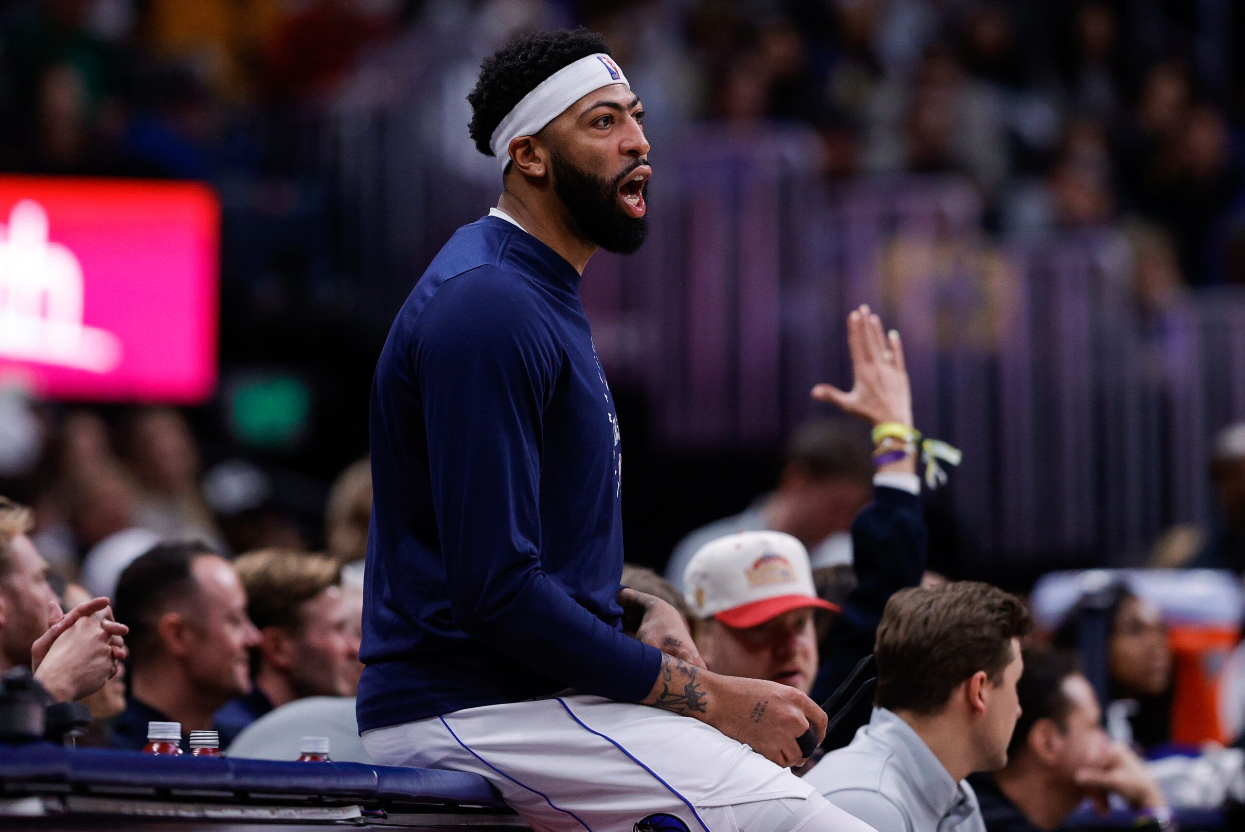 Dallas Mavericks forward Anthony Davis (3) reacts from the sideline in the second quarter against the Denver Nuggets at Ball Arena.
