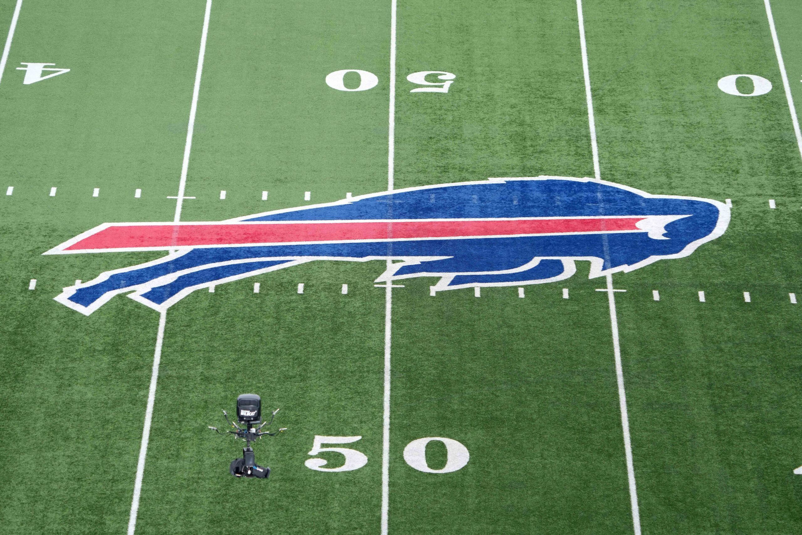 The Buffalo Bills logo at midfield at a 2024 AFC wild card game at Highmark Stadium.
