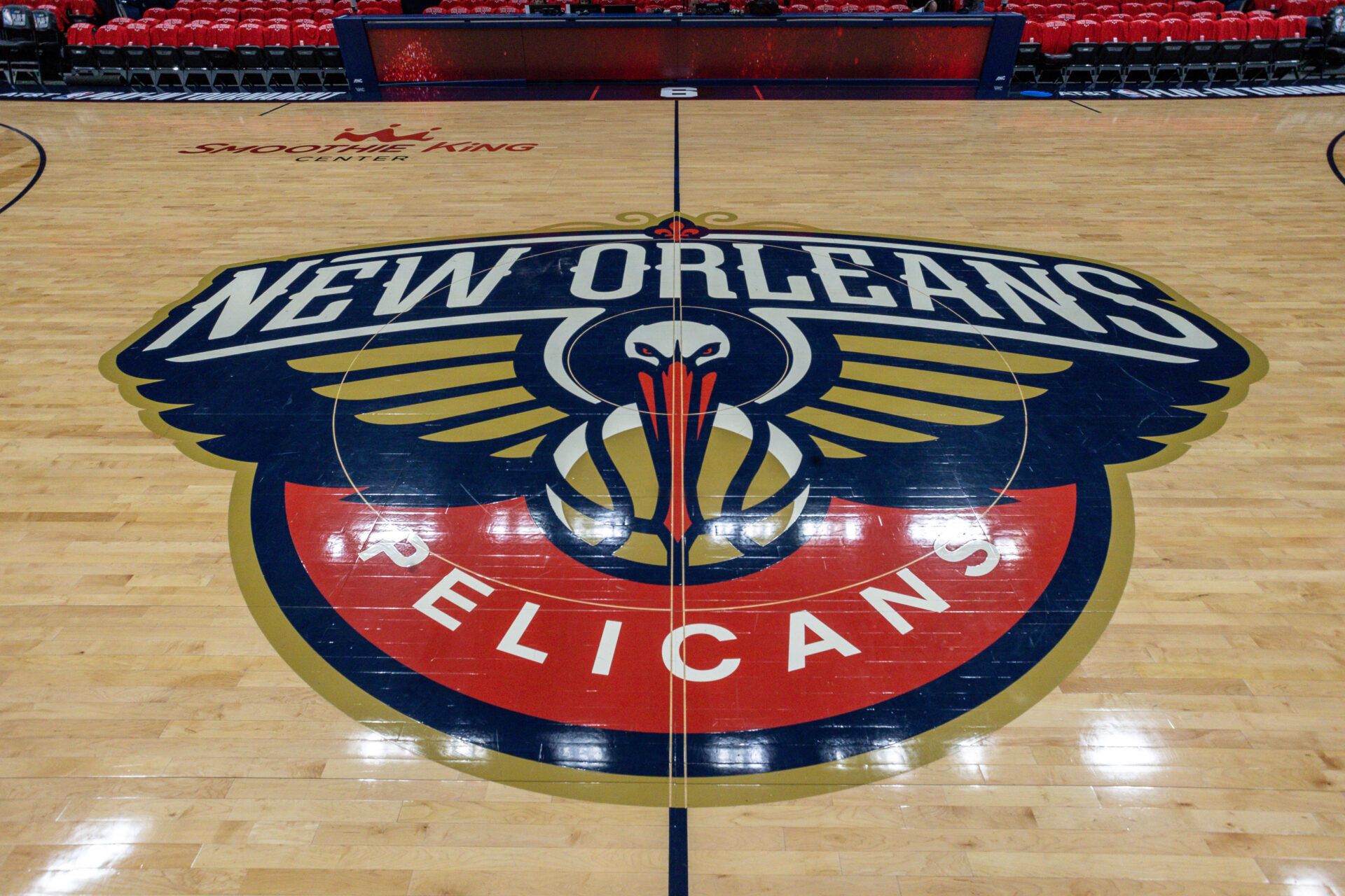 Detailed view of the New Orleans Pelicans logo at mid court before the Play-In game against the Oklahoma City Thunder at Smoothie King Center.