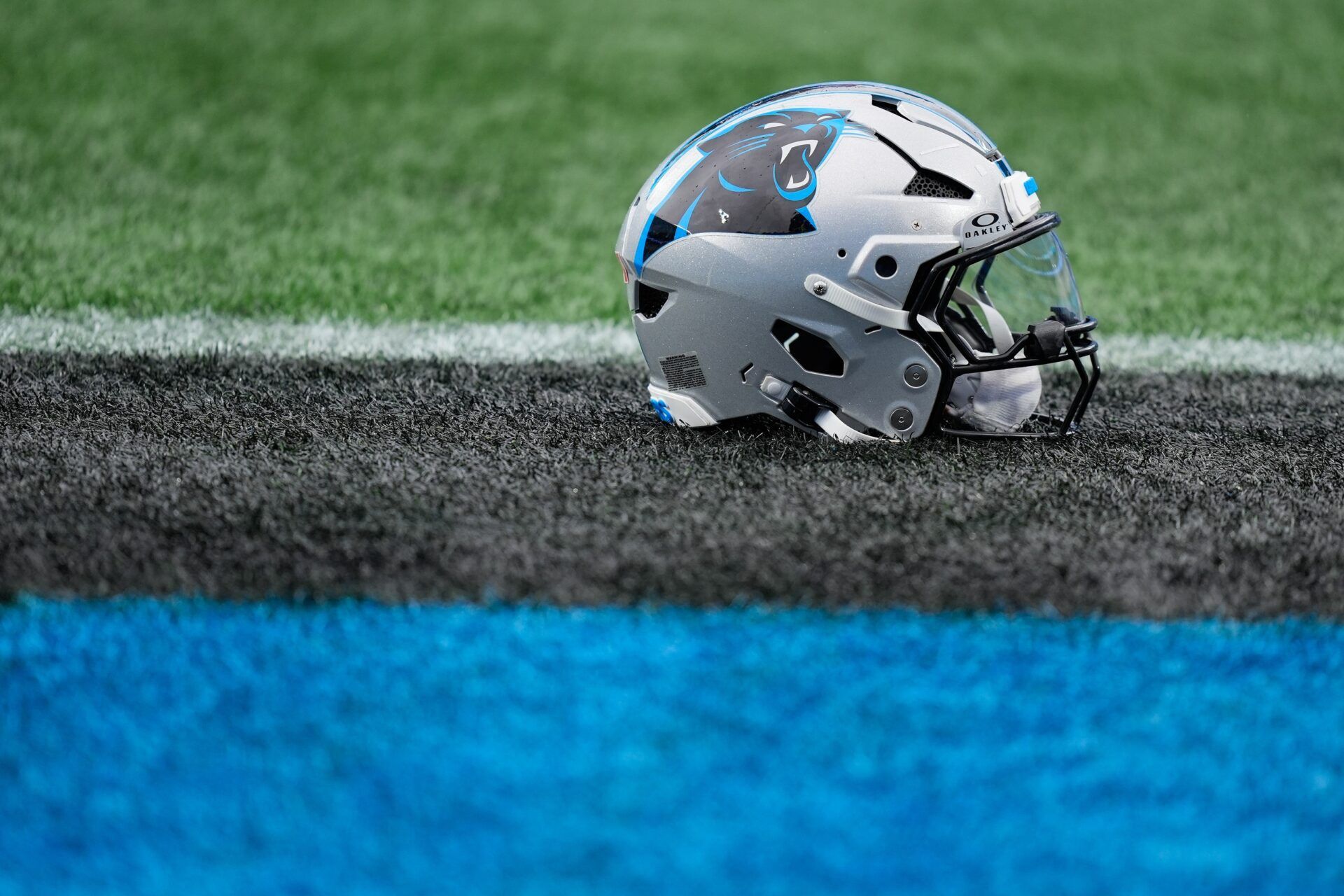 A view of a Carolina Panthers helmet on the field before the game against the Los Angeles Rams at Bank of America Stadium.