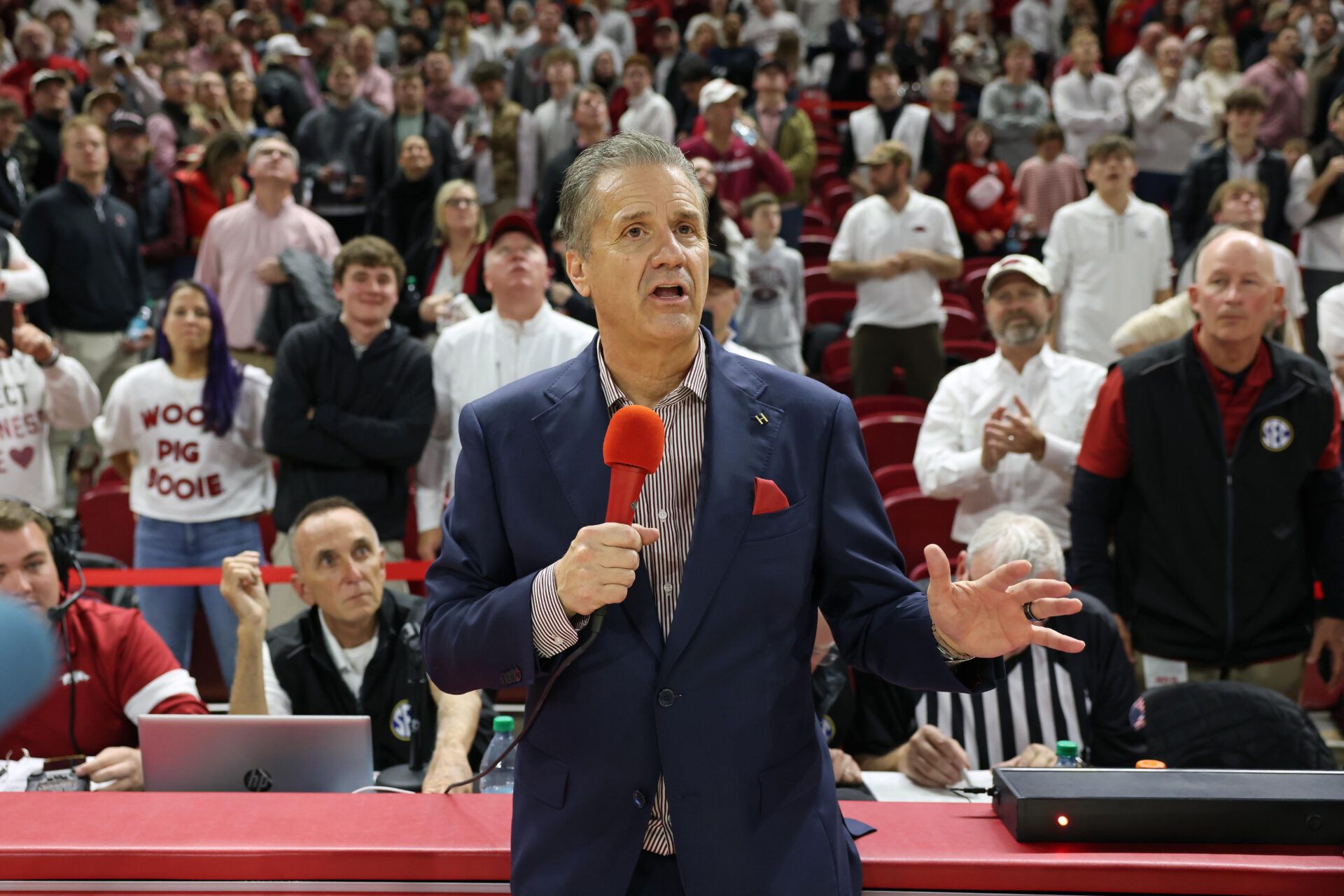 Arkansas Razorbacks head coach John Calipari addresses the crowd after a game against the Louisville Cardinals at Bud Walton Arena. Arkansas won 89-80.