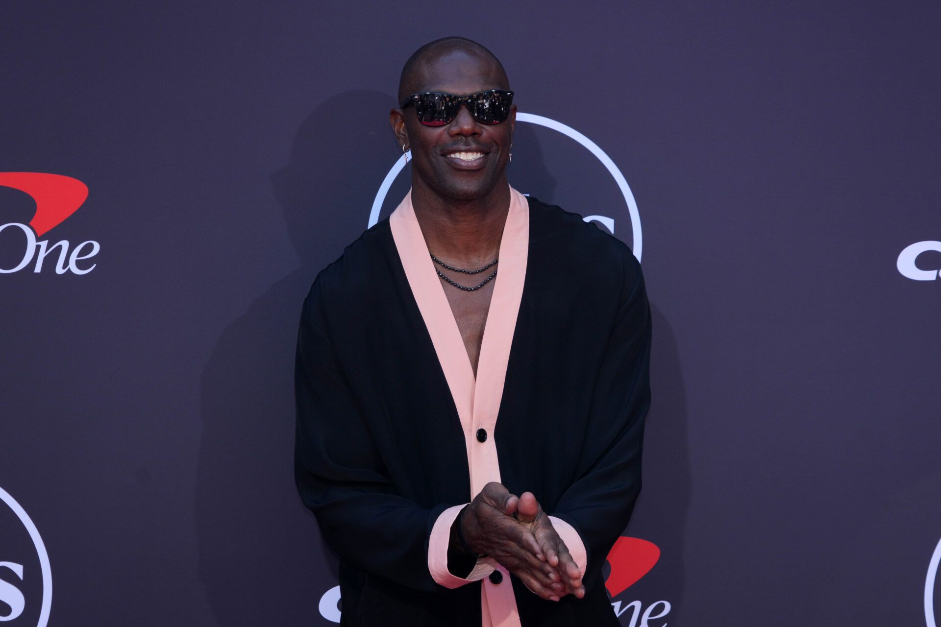 Terrell Owens poses on the ESPYs red carpet at the Dolby Theatre.