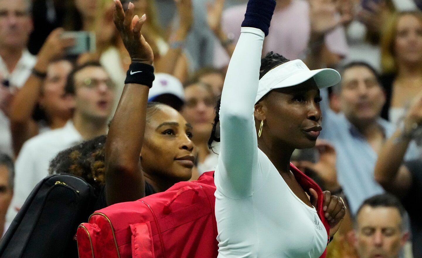 Serena Williams and Venus Williams of the USA wave after losing to Lucie Hradecka and Linda Noskova of the Czech Republic in Woman's Doubles on day four of the 2022 U.S. Open tennis tournament at USTA Billie Jean King National Tennis Center.