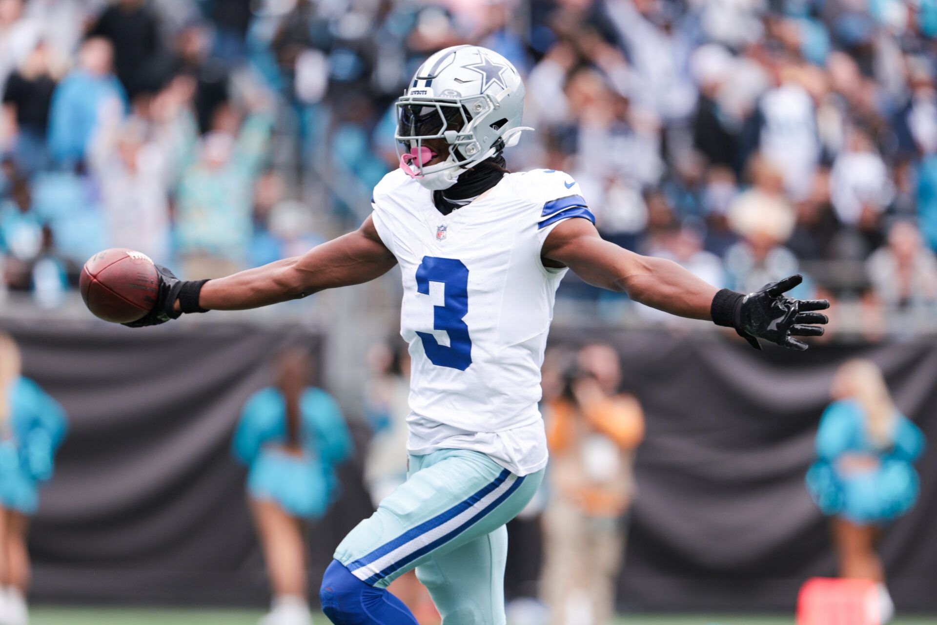 Dallas Cowboys wide receiver George Pickens (3) celebrates a touchdown during the second half against the Carolina Panthers at Bank of America Stadium.