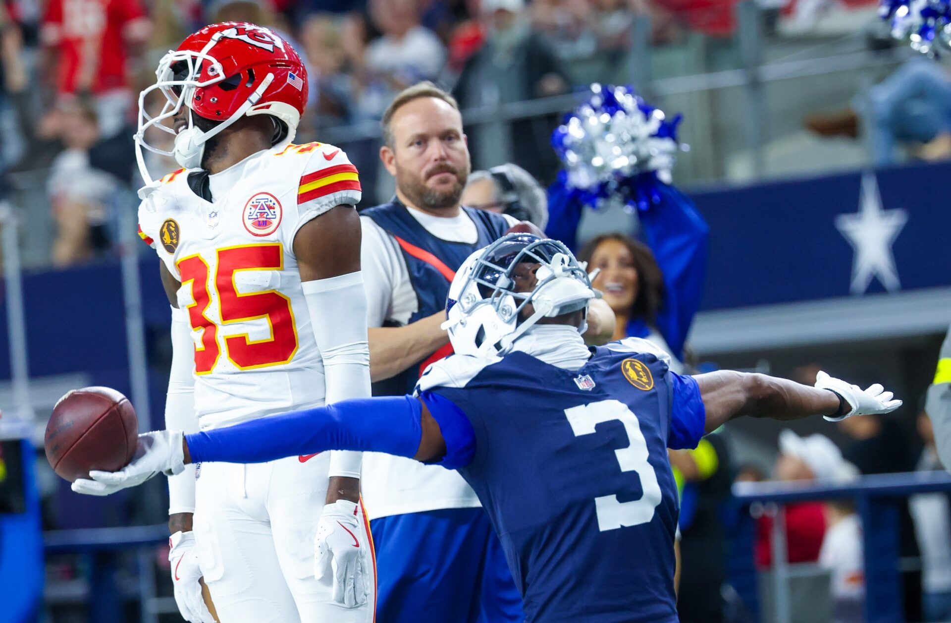 Dallas Cowboys wide receiver George Pickens (3) celebrates in front of Kansas City Chiefs cornerback Jaylen Watson (35) during the game at AT&T Stadium.