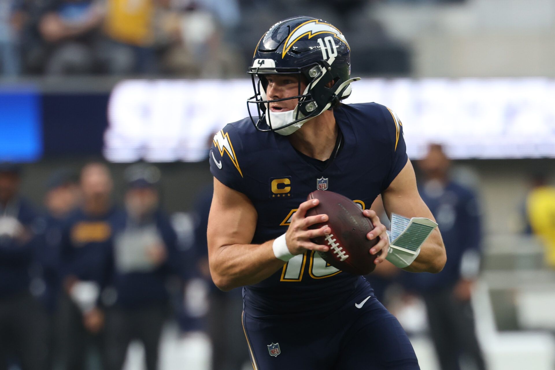 Los Angeles Chargers quarterback Justin Herbert (10) drops back to pass against the Las Vegas Raiders during the first half at SoFi Stadium.