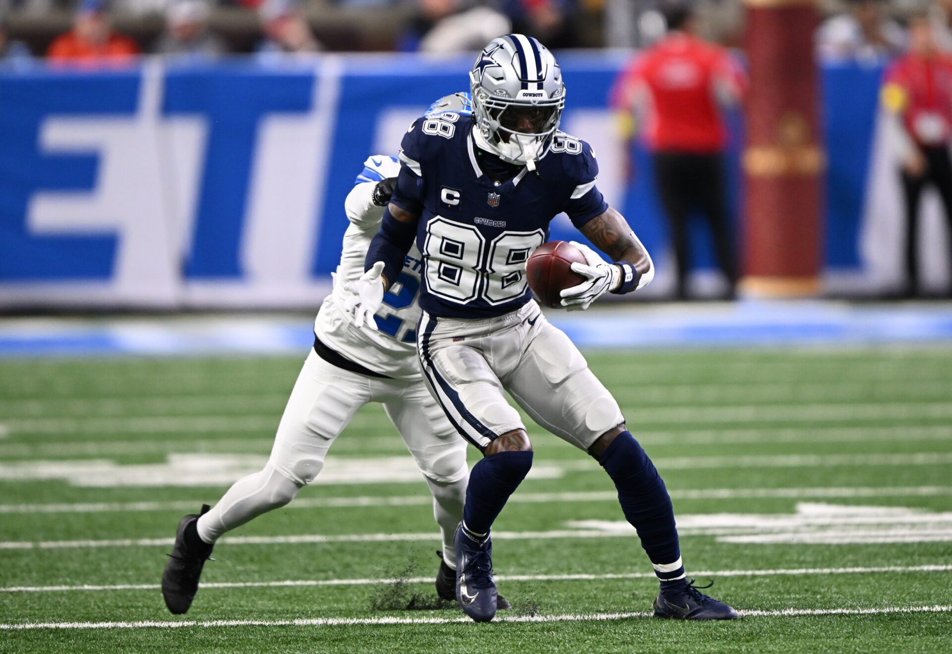 Dallas Cowboys wide receiver CeeDee Lamb (88) runs after a catch during the first half against the Dallas Cowboys at Ford Field.