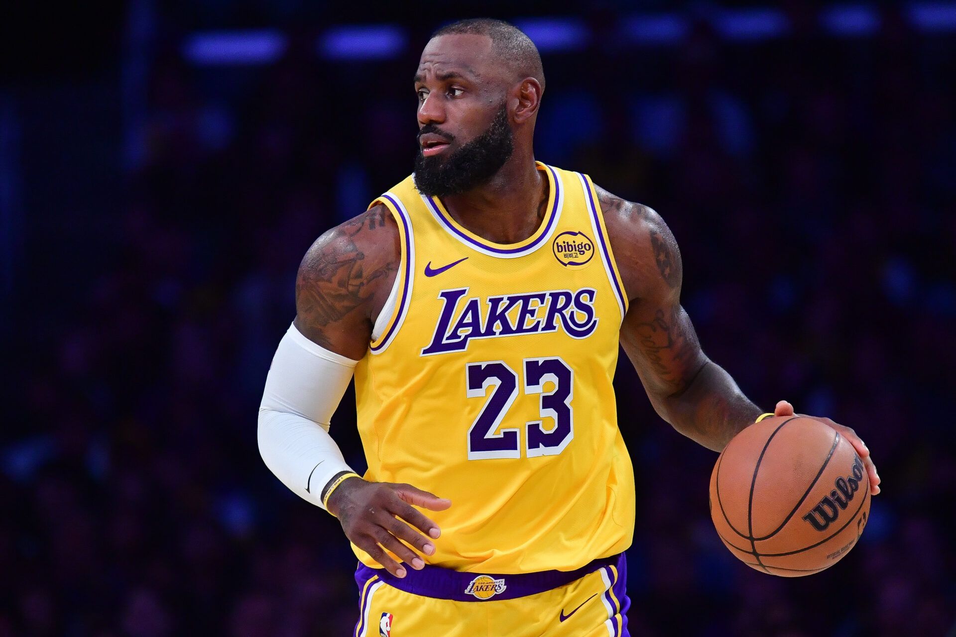 Los Angeles Lakers forward LeBron James (23) brings the ball up court against the Phoenix Suns during the second half at Crypto.com Arena.