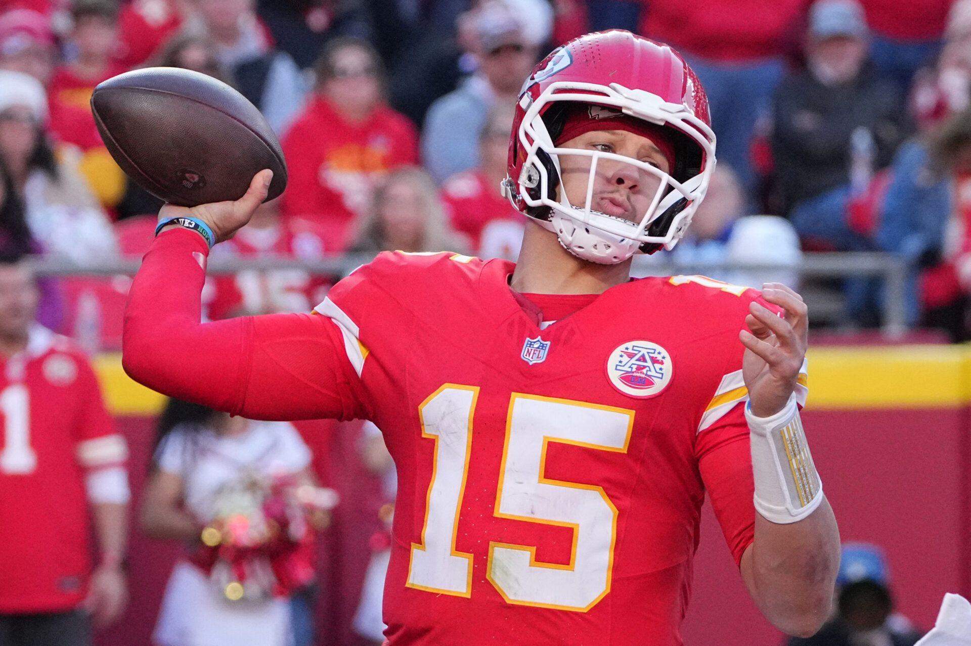 Kansas City Chiefs quarterback Patrick Mahomes (15) throws a pass against the Indianapolis Colts in the second half at GEHA Field at Arrowhead Stadium.