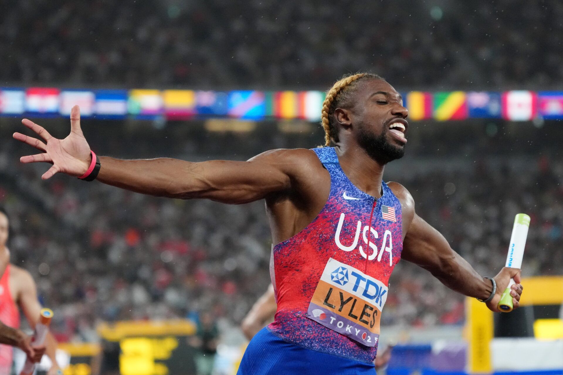 Noah Lyles (USA) reacts after winning the mens 4x100m relay final at National Stadium.