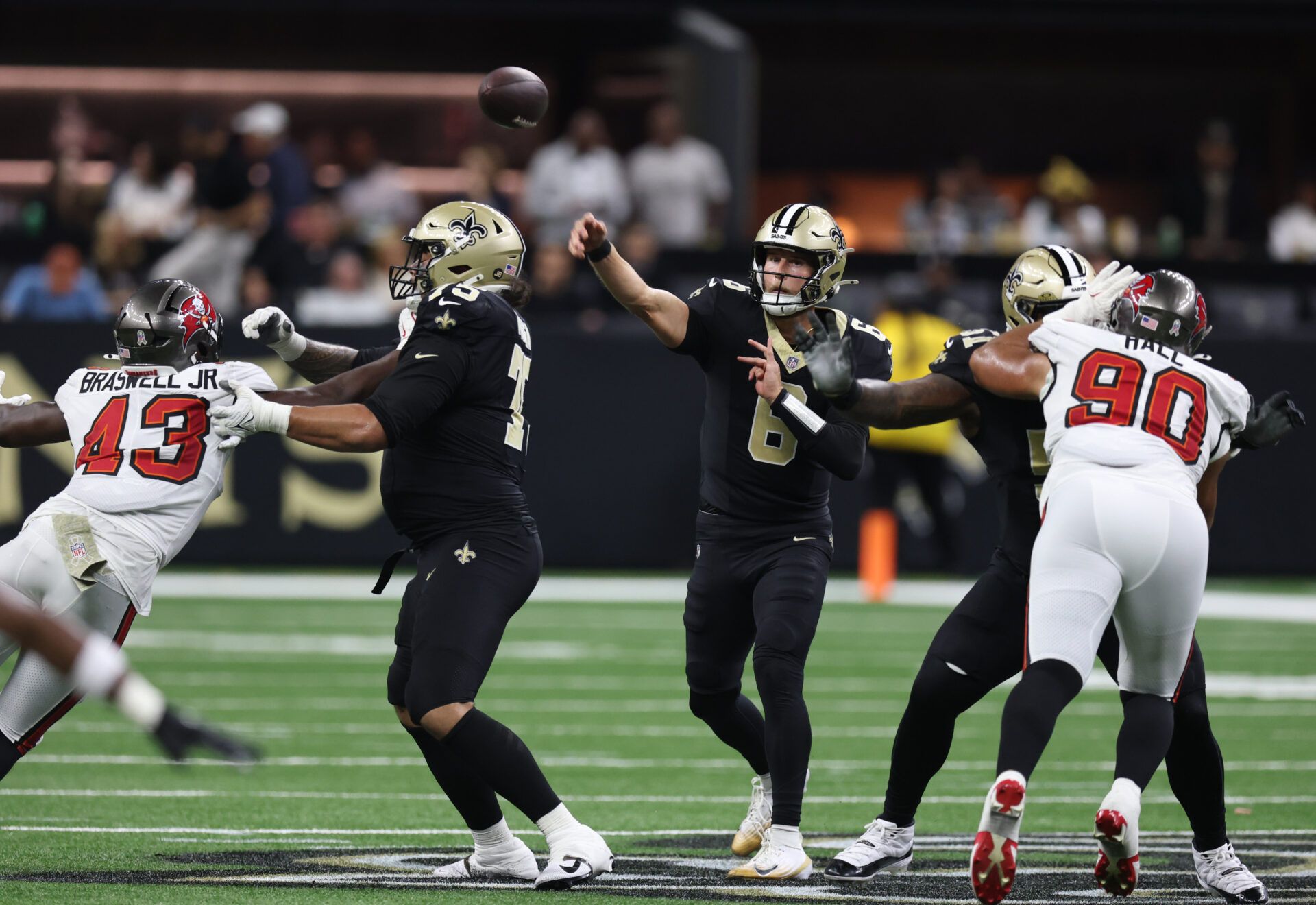 New Orleans Saints quarterback Tyler Shough (6) throws downfield during the fourth quarter against the Tampa Bay Buccaneers at Caesars Superdome.