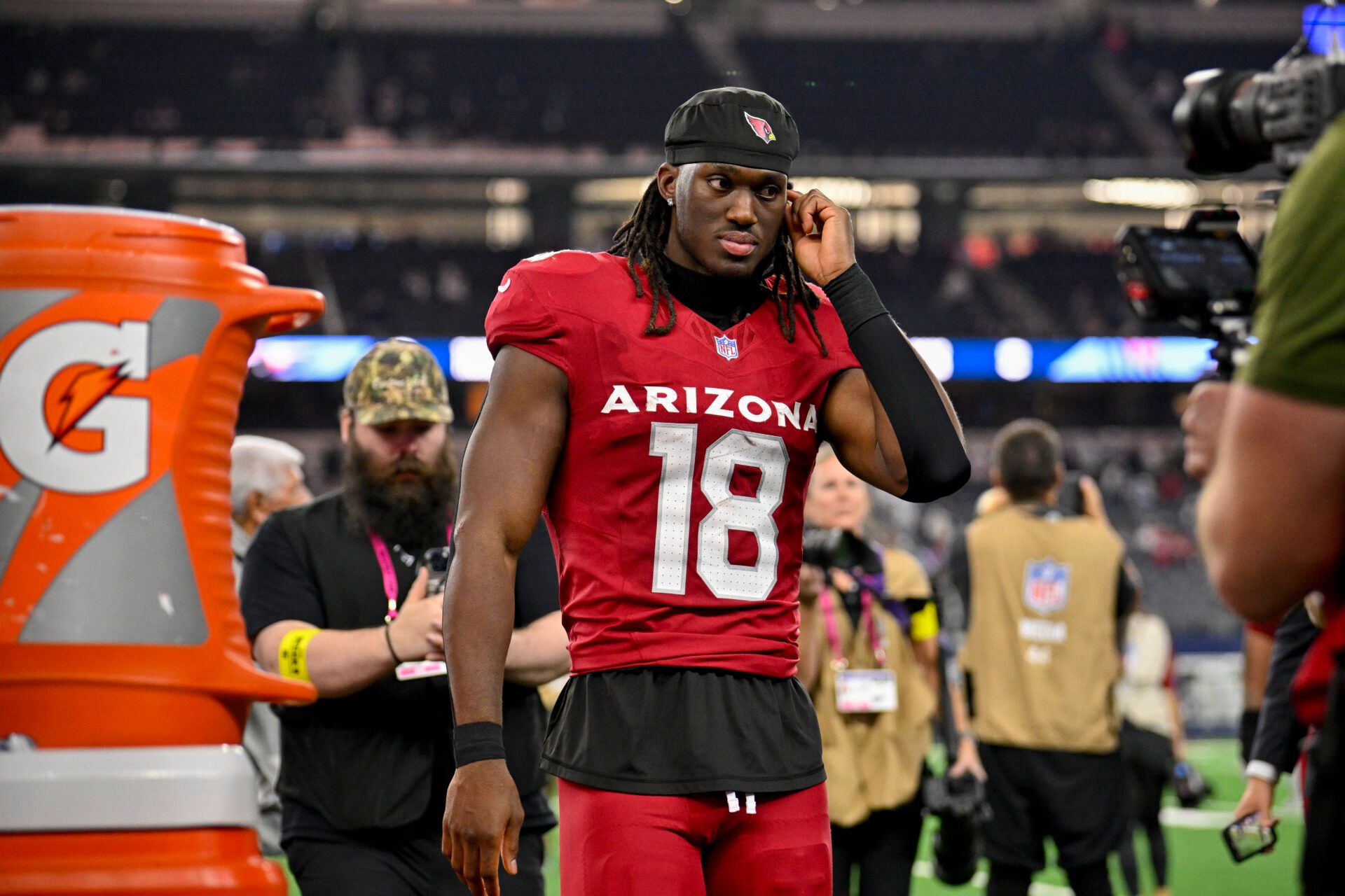 Arizona Cardinals wide receiver Marvin Harrison Jr. (18) walks off the field after the game between the Dallas Cowboys and the Arizona Cardinals at AT&T Stadium.