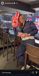 Aryna Sabalenka with Atlanta Hawks' photo props