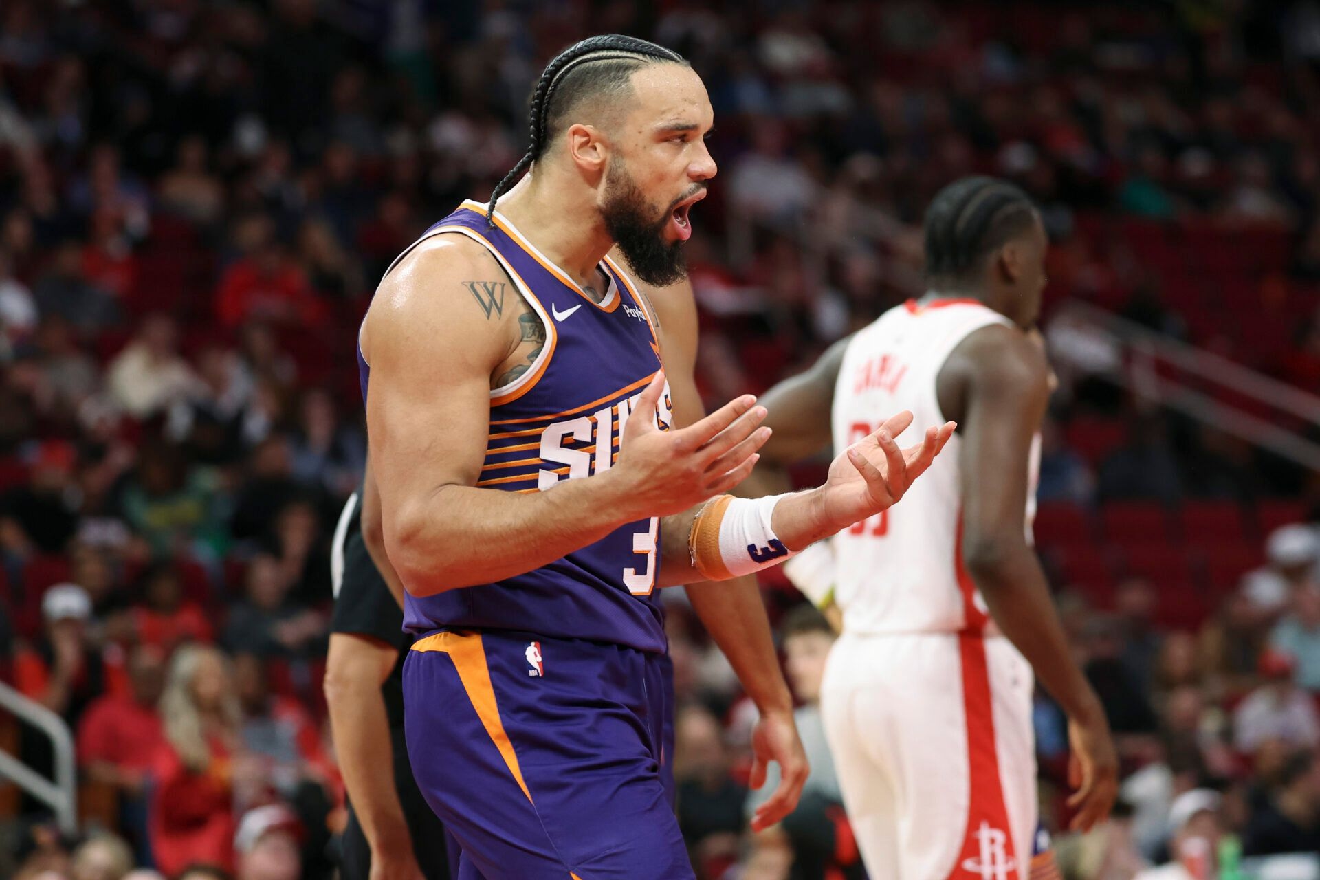 Phoenix Suns forward Dillon Brooks (3) reacts during the first quarter against the Houston Rockets at Toyota Center.