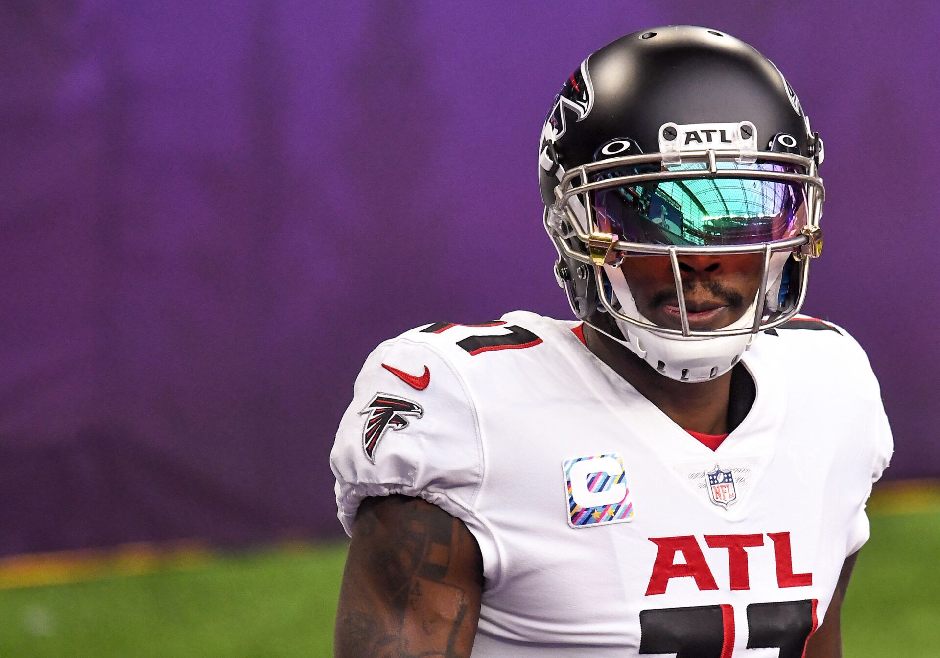 Atlanta Falcons wide receiver Julio Jones (11) looks on during warm-ups before a game against the Minnesota Vikings at U.S. Bank Stadium.