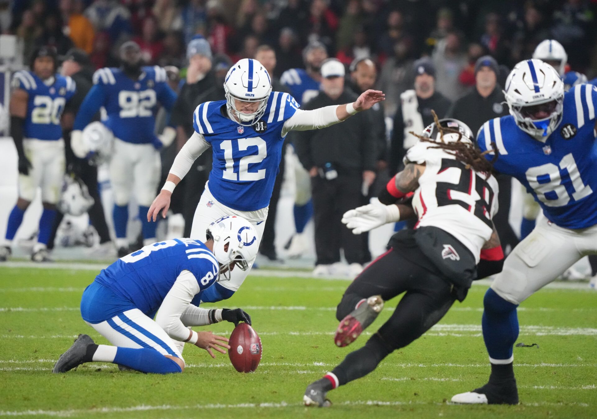 Indianapolis Colts place kicker Michael Badgley (12) kicks a field goal against the Atlanta Falcons during the NFL Berlin Game at Olympic Stadium.