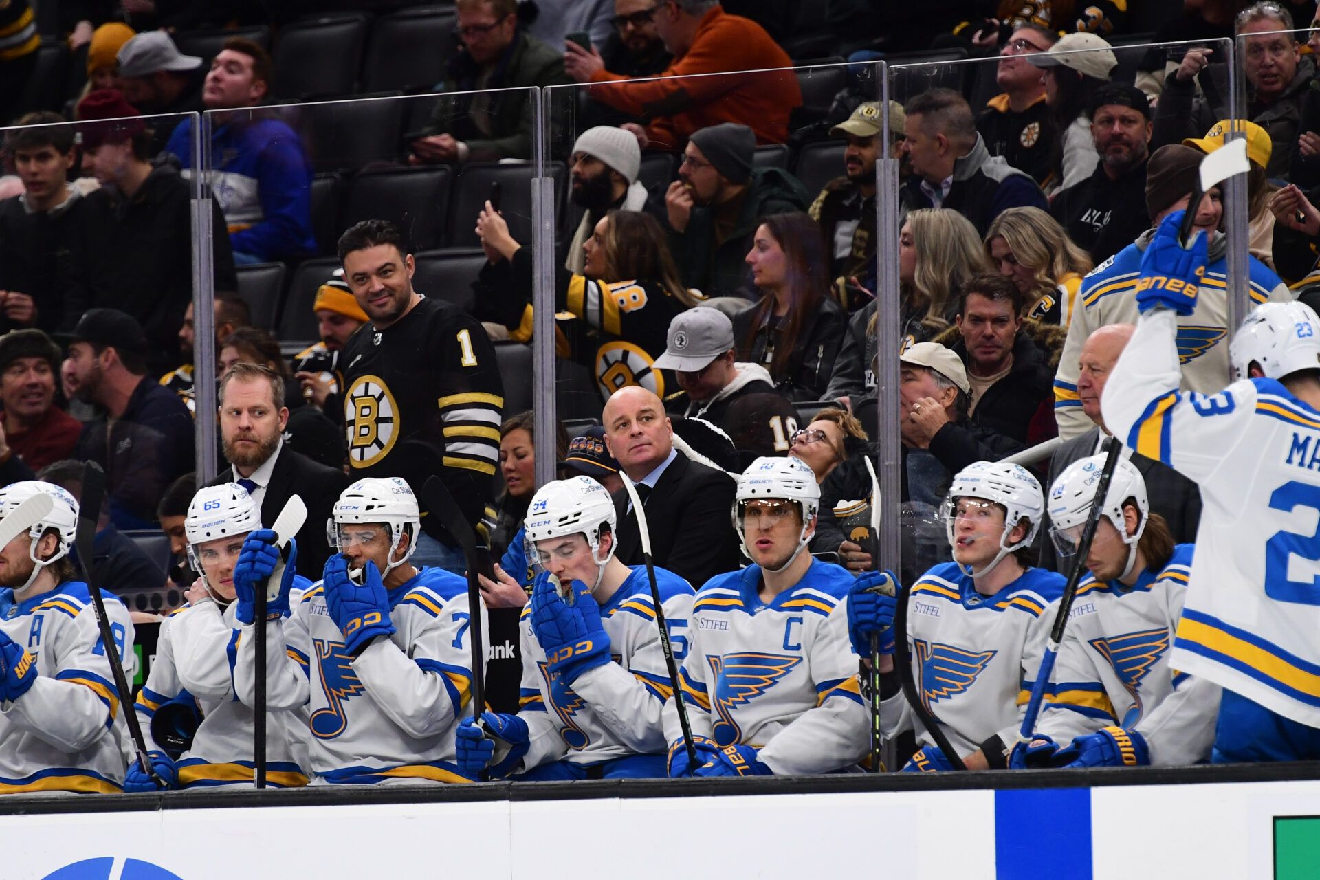 St. Louis Blues head coach Jim Montgomery behind the bench at the start of the third period against the Boston Bruins at TD Garden.