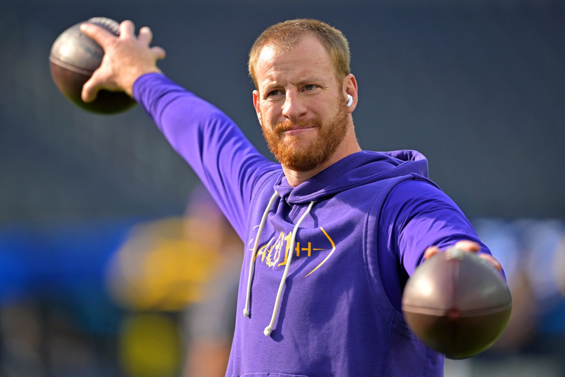 Minnesota Vikings quarterback Carson Wentz (11) warms up prior to the game against the Los Angeles Chargers at SoFi Stadium.