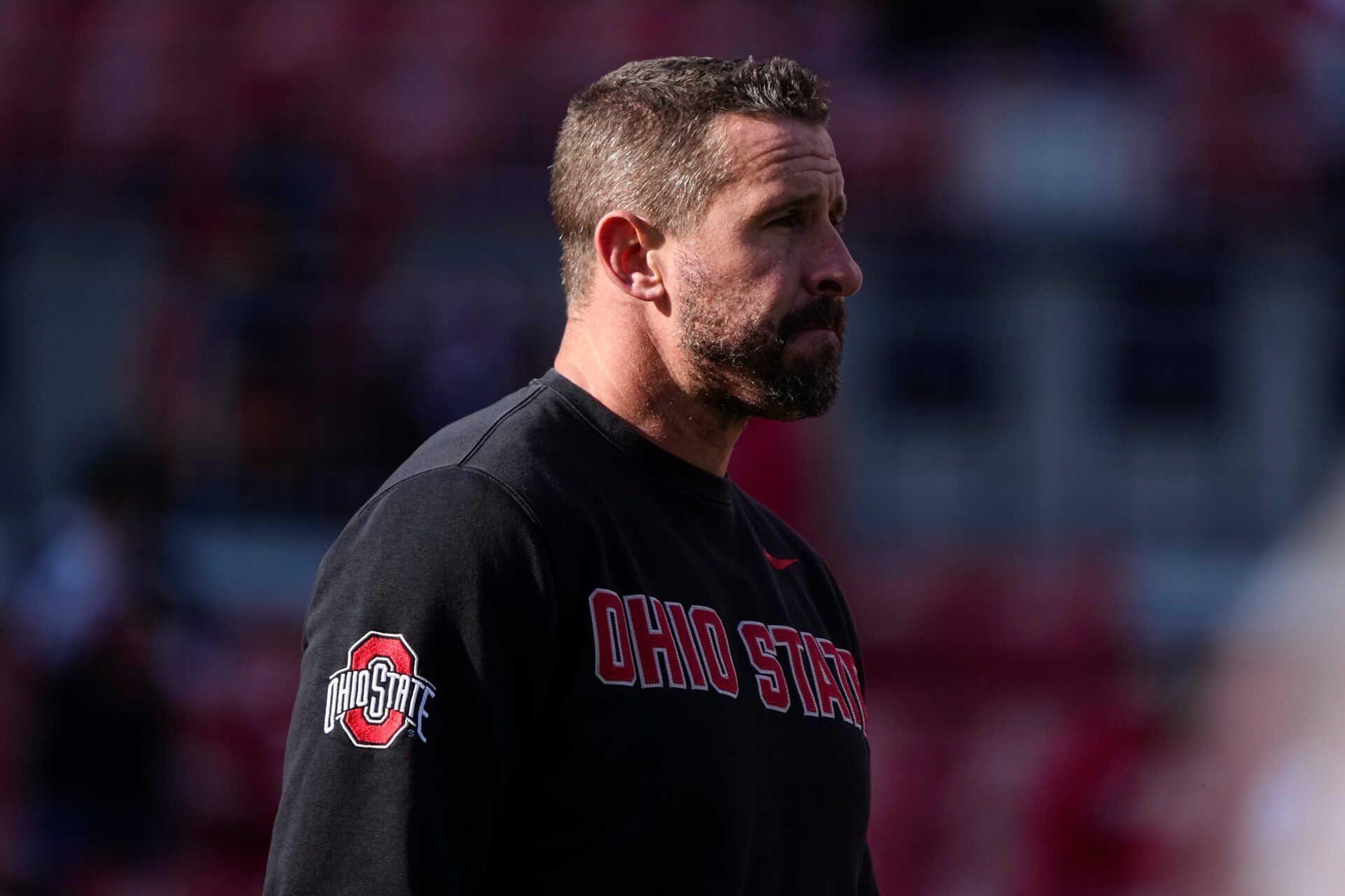 Ohio State Buckeyes offensive coordinator Brian Hartline leads warm ups prior to the NCAA football game against the Rutgers Scarlet Knights at Ohio Stadium in Columbus on Nov. 22, 2025.