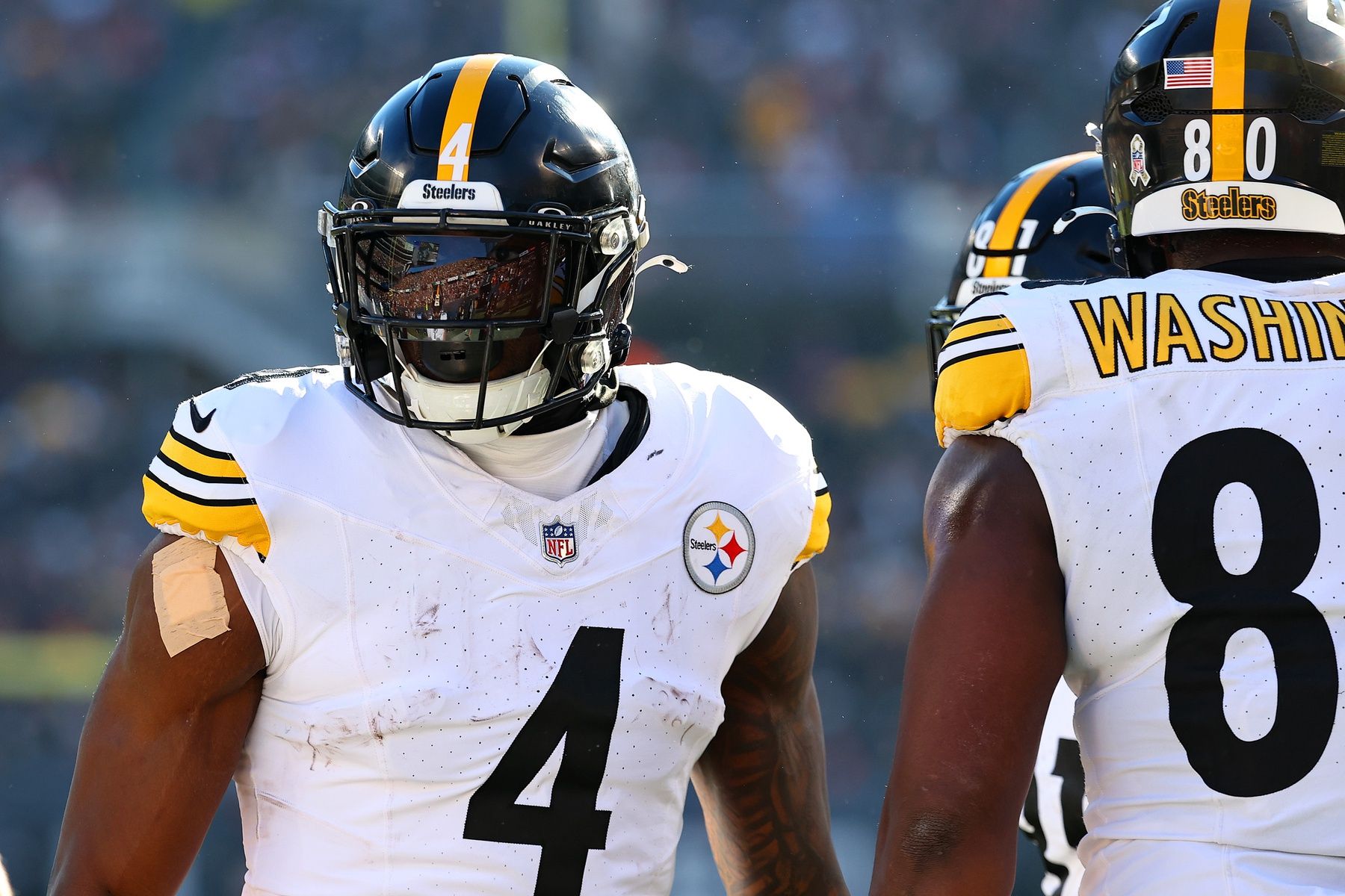 Pittsburgh Steelers wide receiver DK Metcalf (4) reacts after a touchdown against the Chicago Bears during the first half at Soldier Field.
