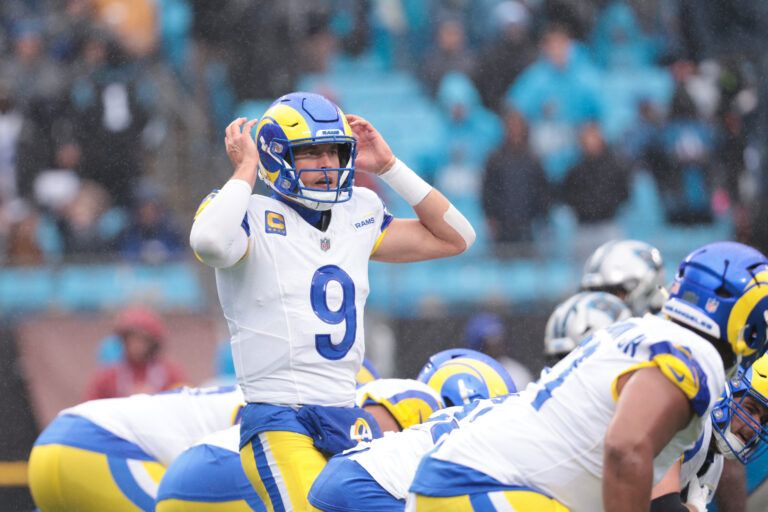 Los Angeles Rams quarterback Matthew Stafford (9) calls a play during the fourth quarter against the Carolina Panthers at Bank of America Stadium.